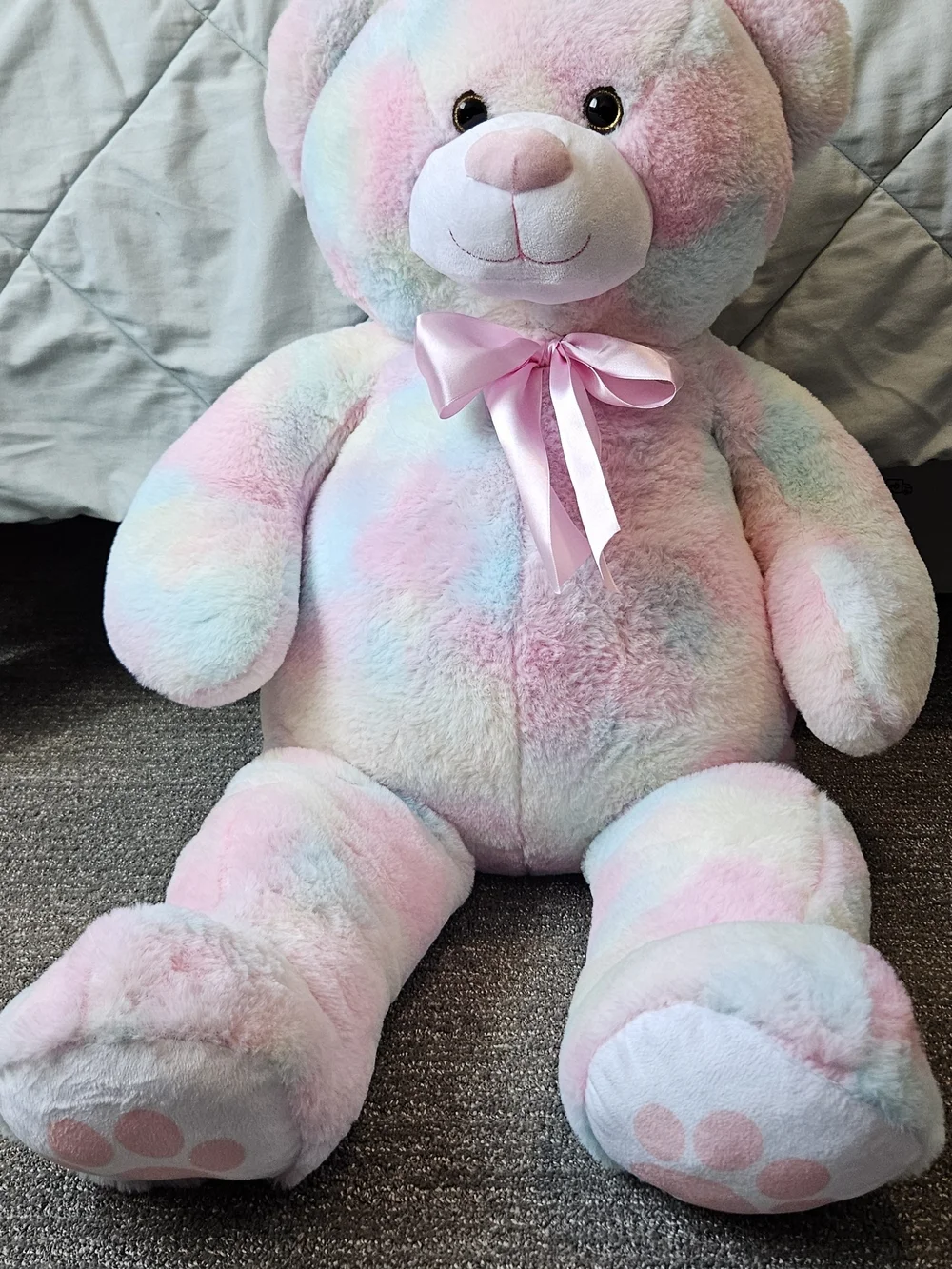Plush Pastel Rainbow Teddy Bear with Pink Bow - Soft Multicolor Cuddly Toy